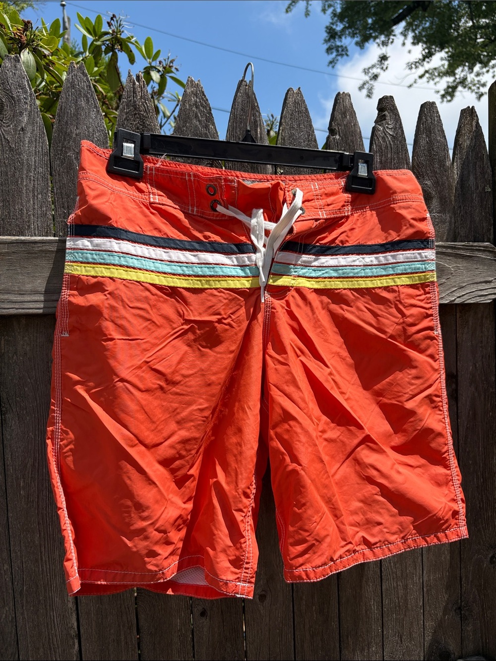 Old Navy medium swim trunks.